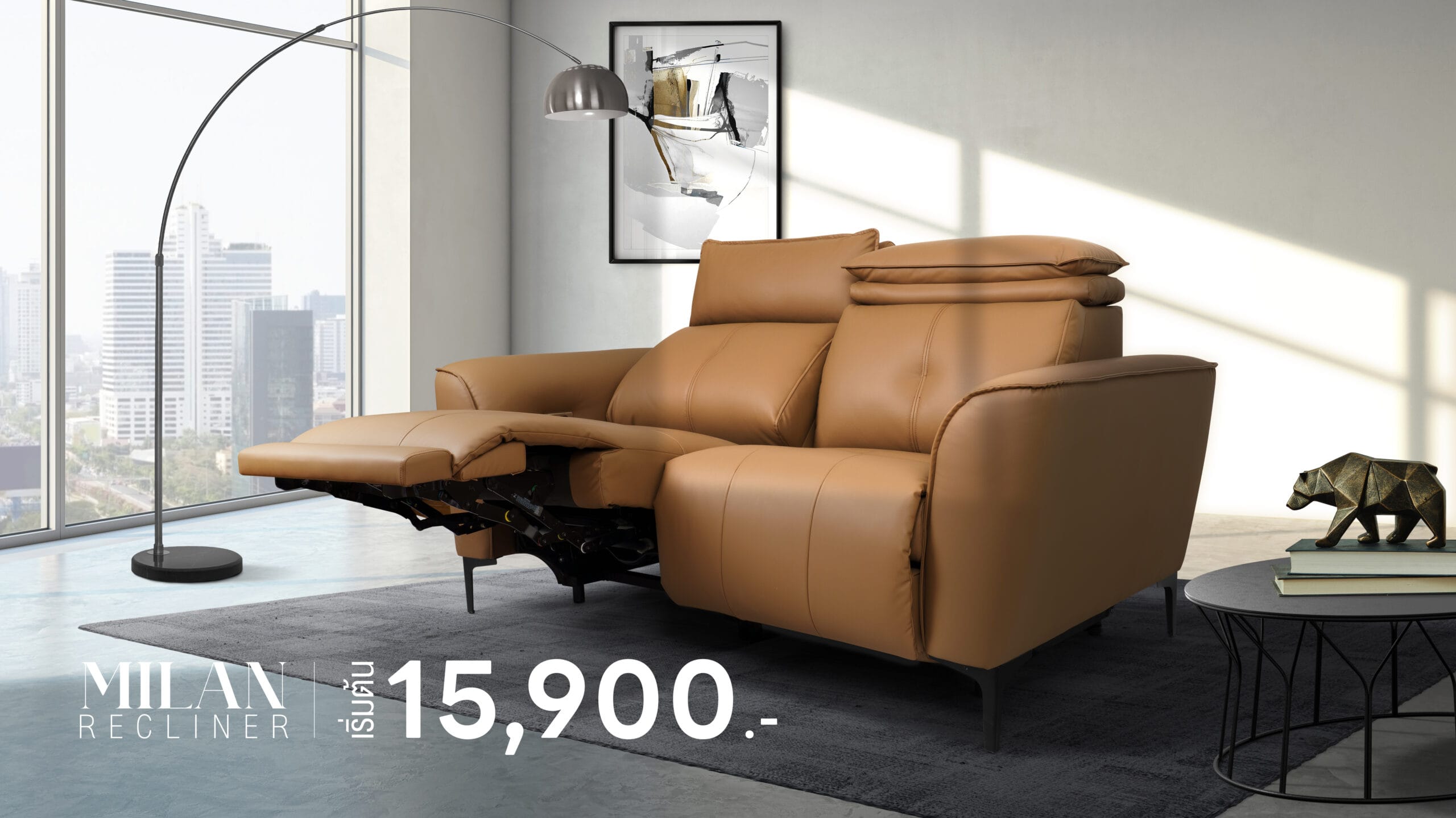 a tan leather couch in a room